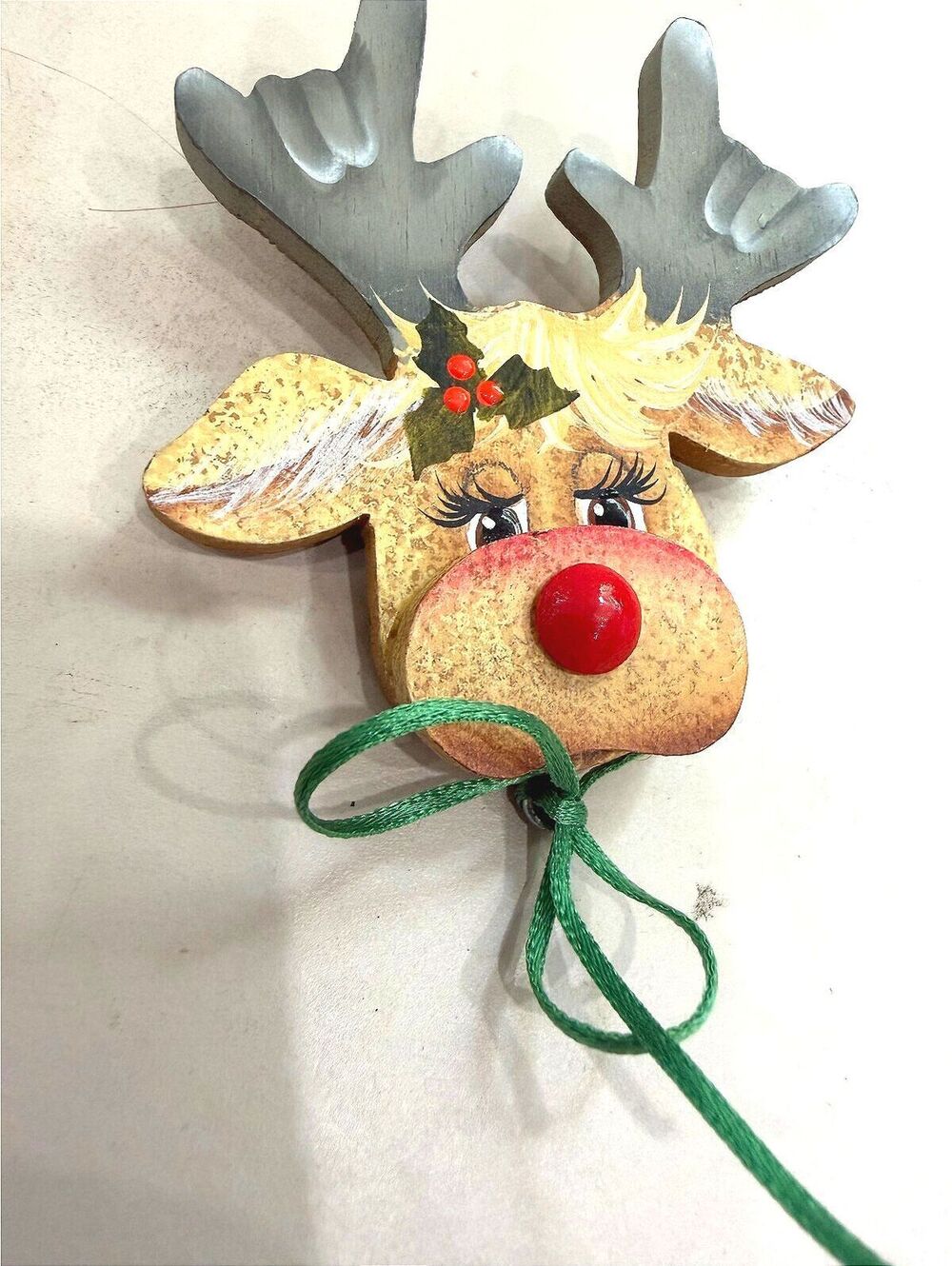 Handcrafted Wooden Reindeer Brooch with Red Nose and Holly Accent